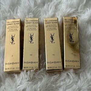 NEW IN BOX- Yves Saint Laurent Loveshine Candy Glaze Lip Gloss Stick- set of 4